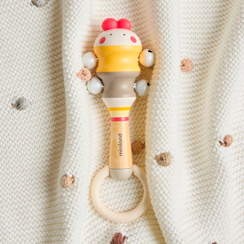 Miniland - Chick bell – sonaglio su una coperta in maglia
