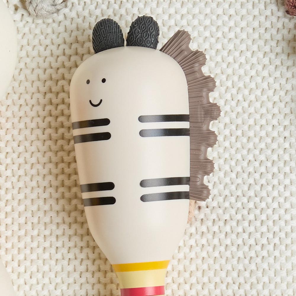 Miniland - Zebra rattle – dettaglio del musetto e della criniera